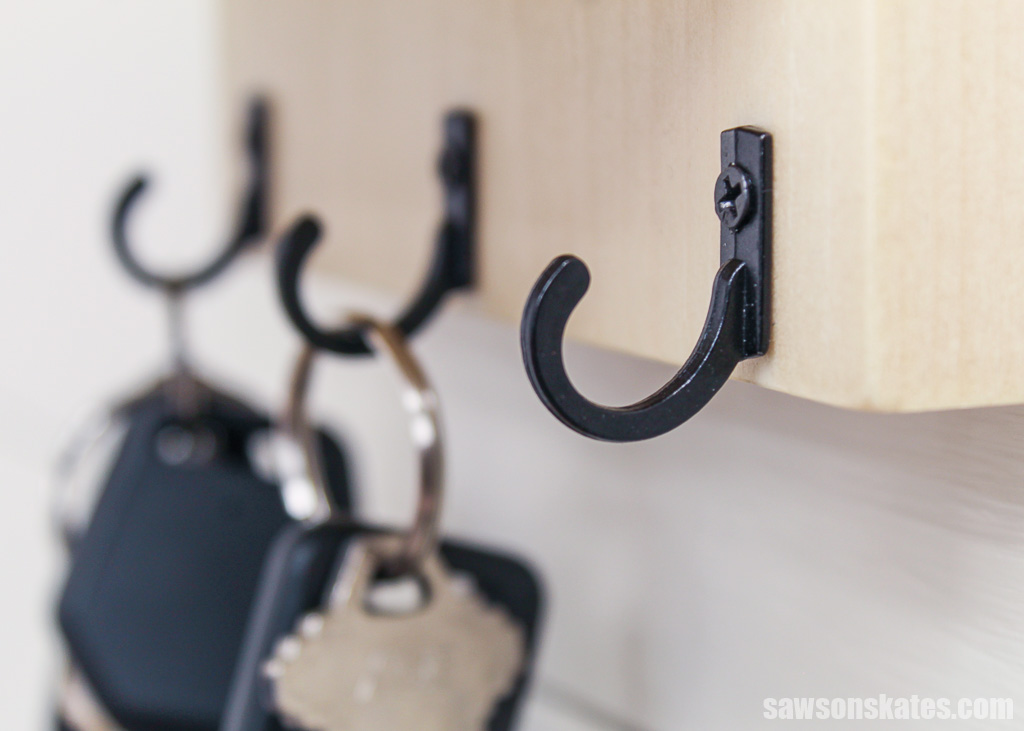Close up of the hooks at the bottom of a DIY key holder