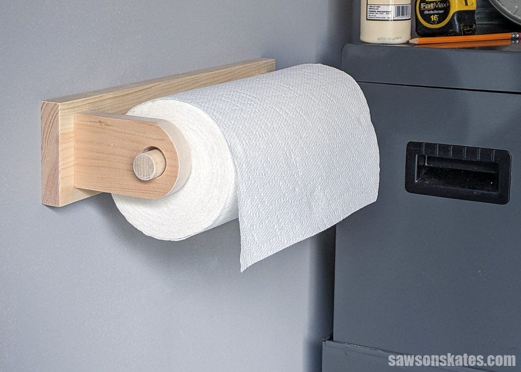 DIY workshop paper towel holder on a wall