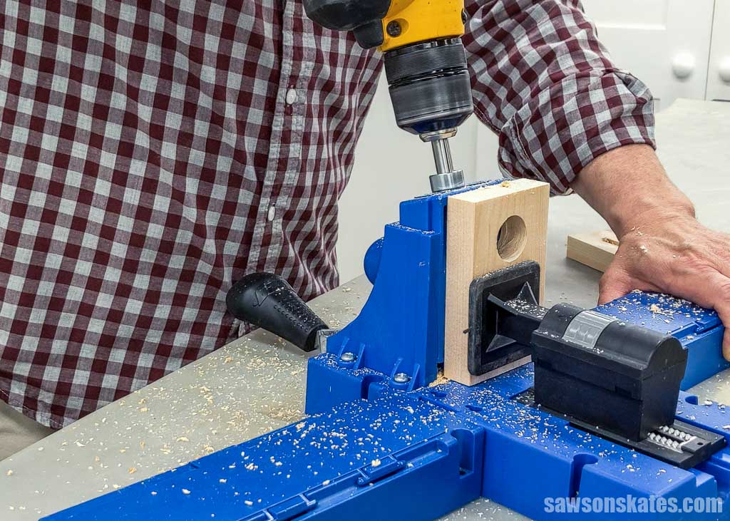 Drilling pocket holes in a board