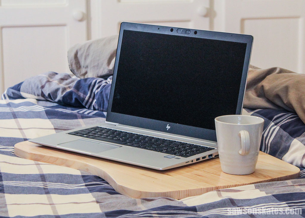 Laptop and coffee mug on an easy DIY lap desk