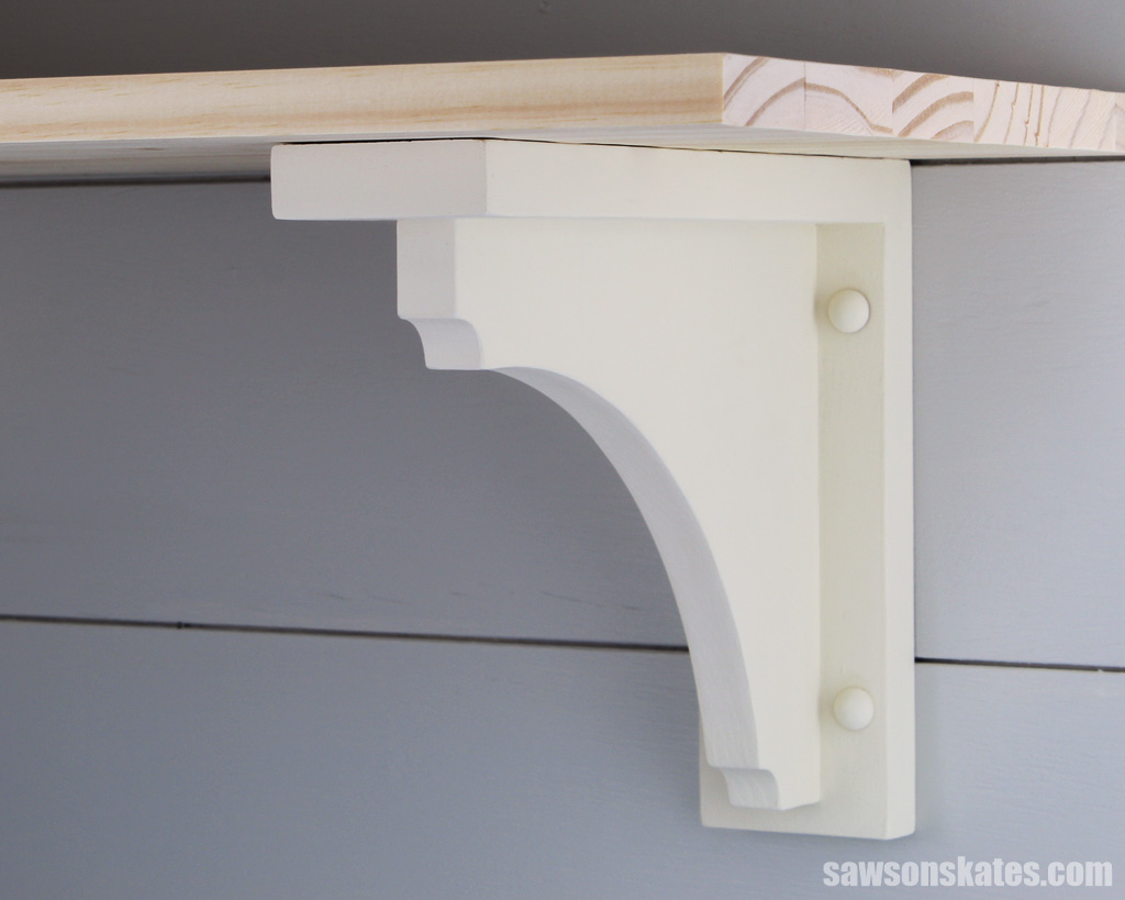 Simple-to-make wood shelf bracket on a wall