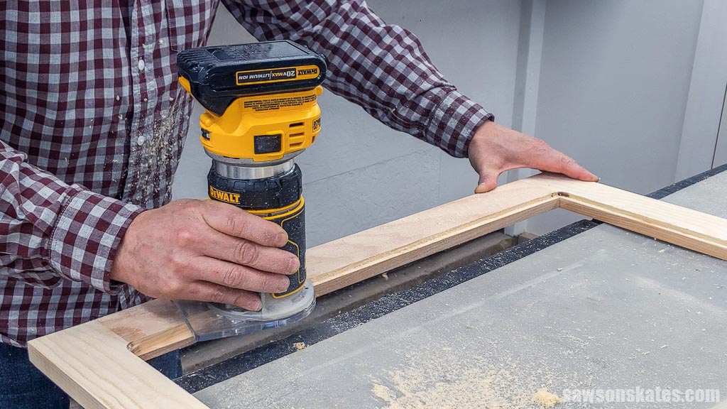 Cutting a rabbet into DIY wood storm window with a router