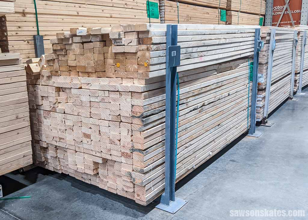 2x4 construction lumber stacked in a store's aisle