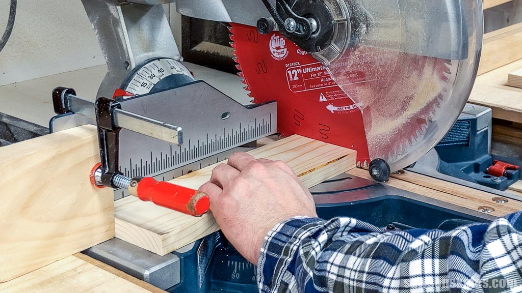 Positioning a workpiece against a saw's blade to fine-tune a cut