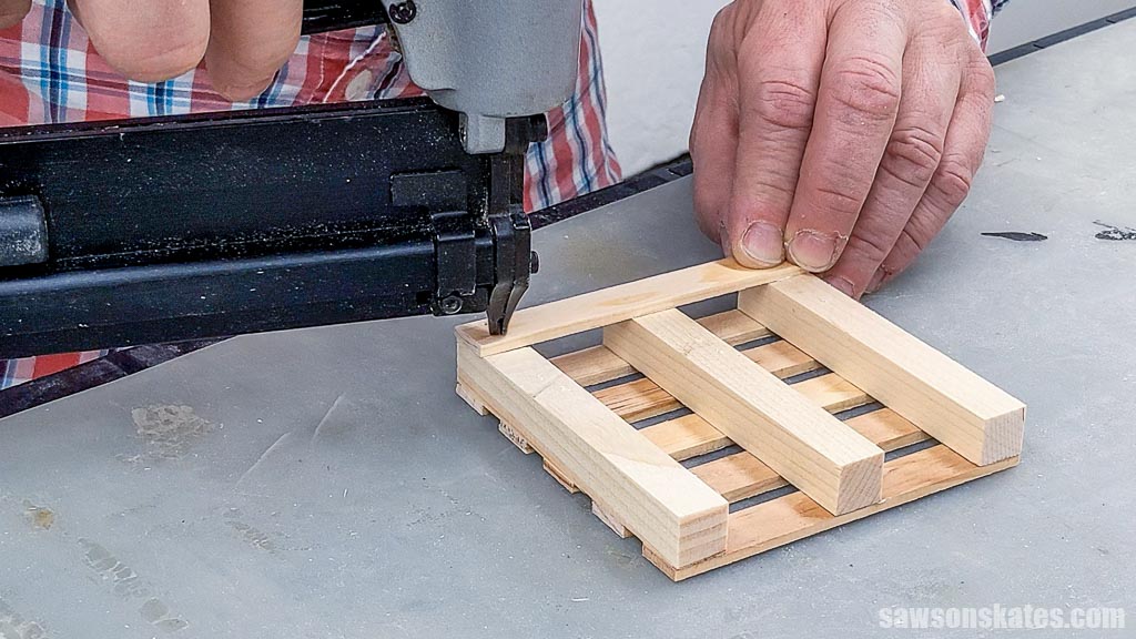 Attaching a bottom deck board to the underside of a mini pallet coaster