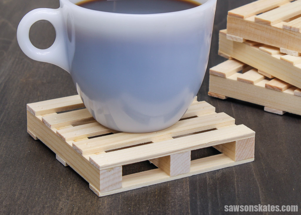 White coffee cup on a DIY mini pallet coaster