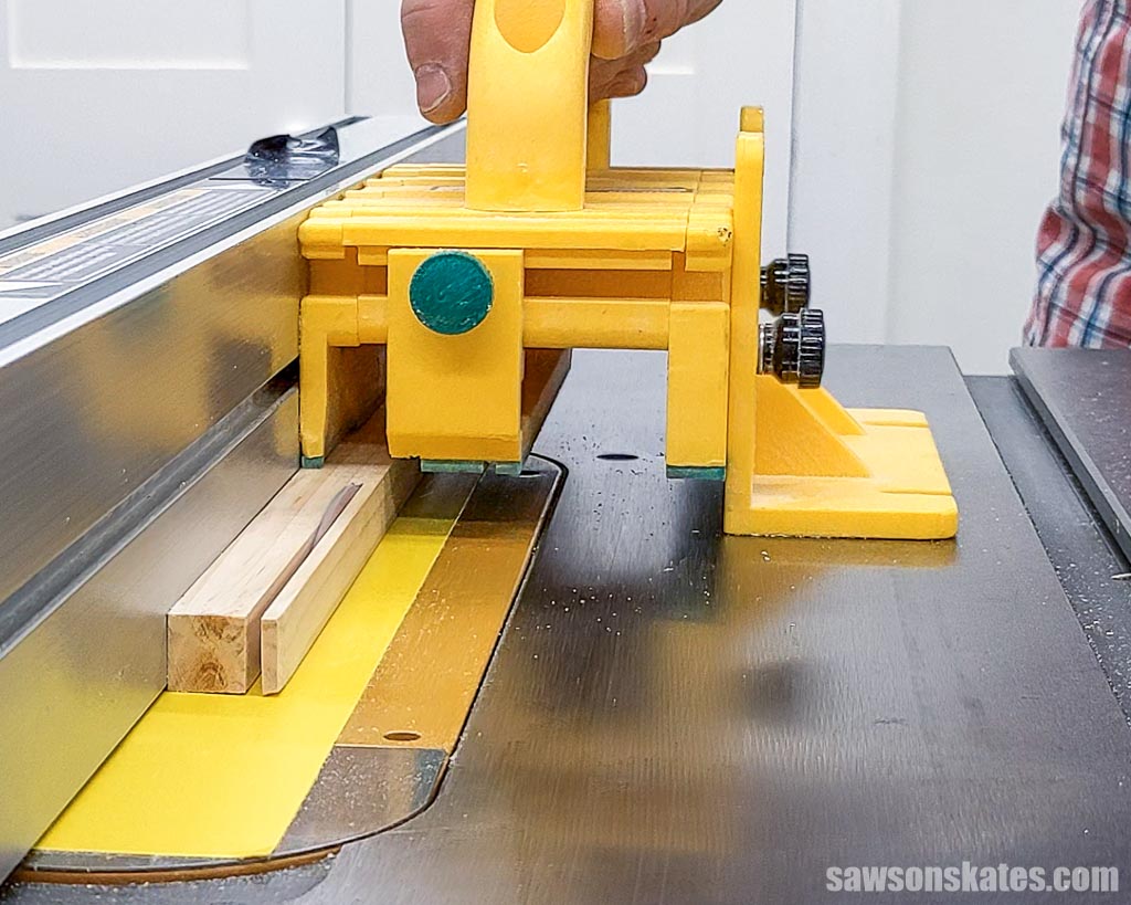 Using a push block to rip even narrower strips on a table saw