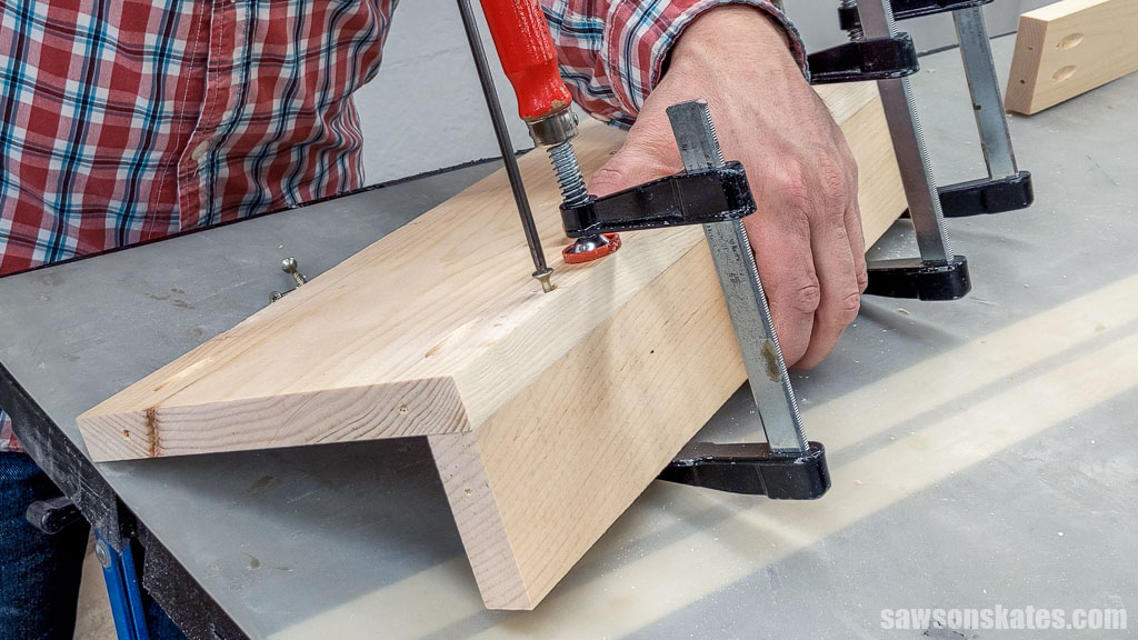Driving screws into a DIY toolbox's tray rail