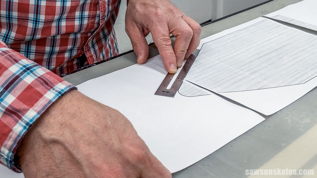 Using a ruler to align the sheets for a DIY toolbox template