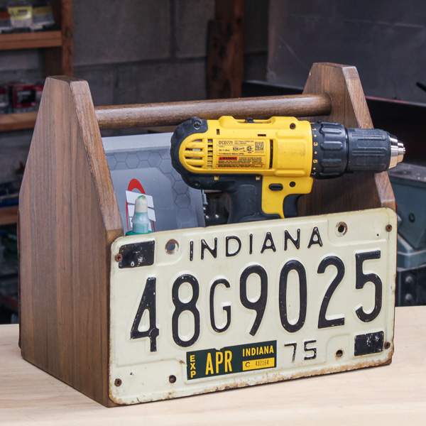 DIY wooden tool tote with upcycled license plates