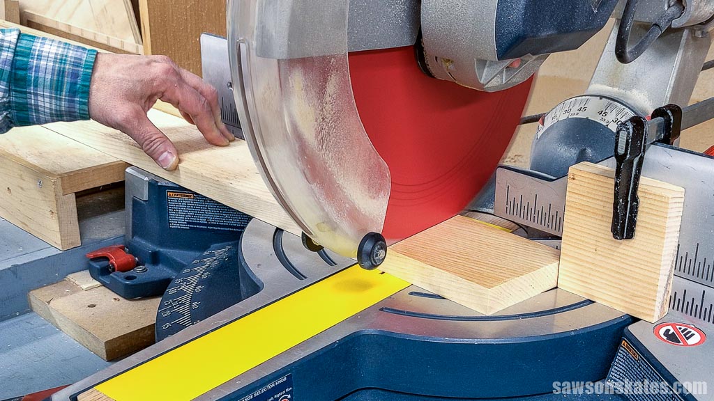 Cutting an angle on the other end of a board for a DIY bedside table's aprons