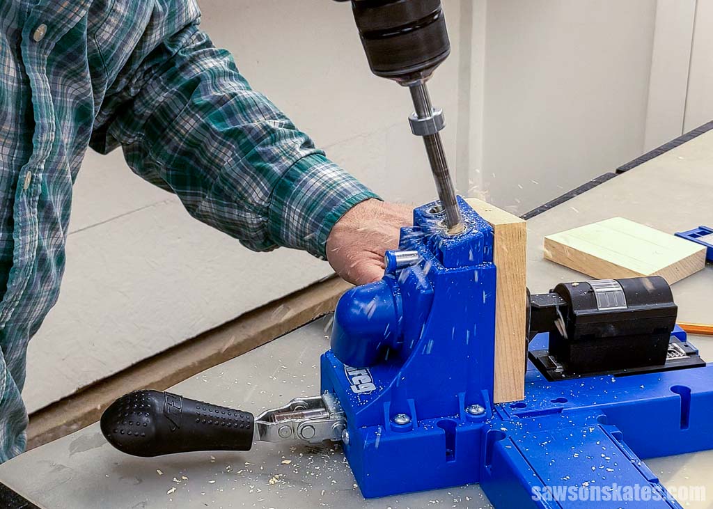 Using a pocket hole jig to make pocket holes in a board