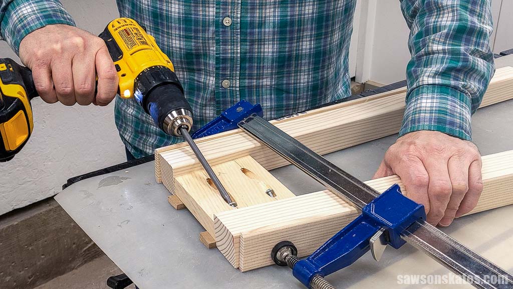 Driving pocket screws to attach a DIY bedside table's apron to its legs