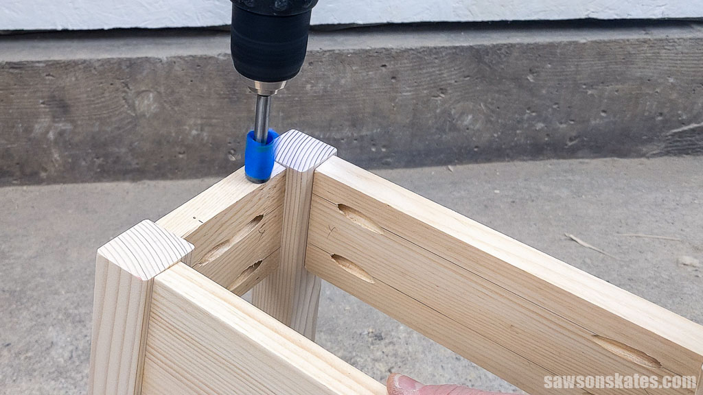 Making a hole for a table top fastener with a Forstner bit