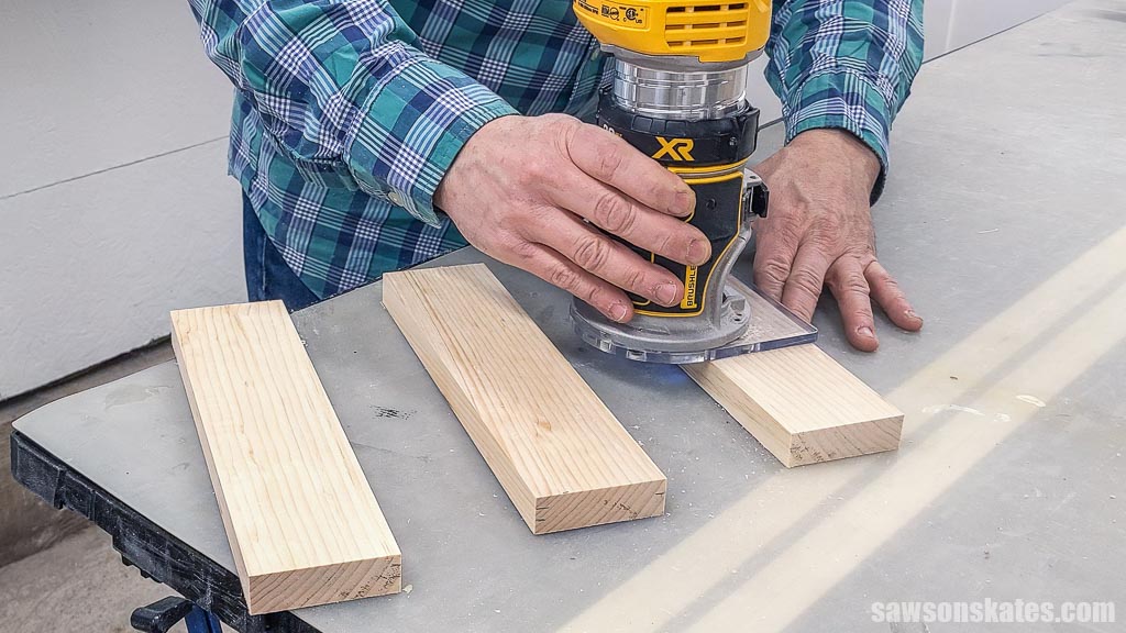 Chamfering the edges of a key holder cabinet's door with a router