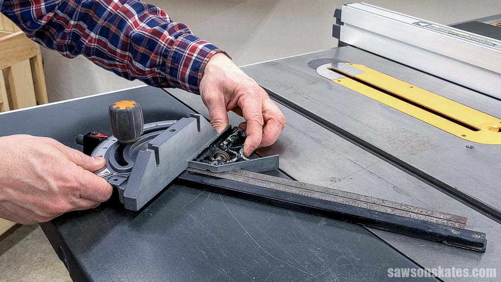 Tuning the miter gauge of a table saw with a combination square