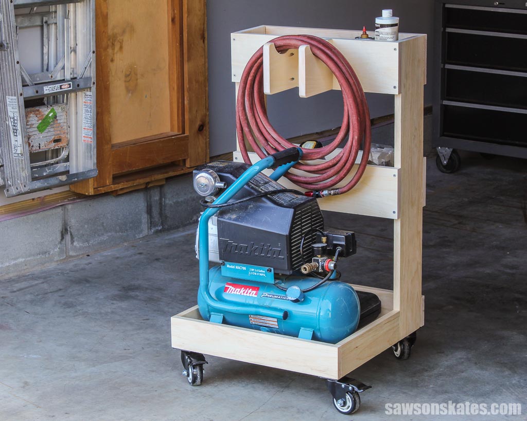 DIY air compressor cart with storage trays and air hose holder