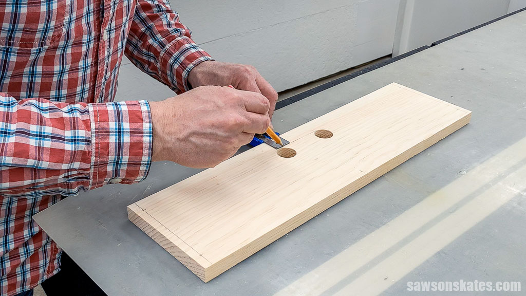 Drawing lines to between two holes to make a handle opening