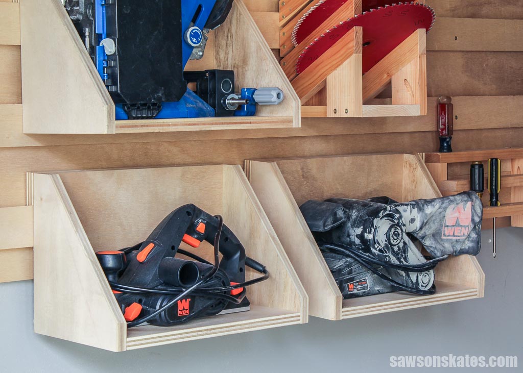 French cleat wall with three DIY tool storage shelves