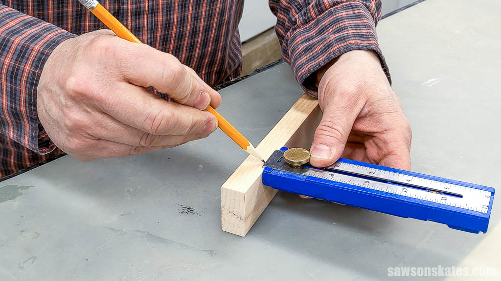 Transferring the thickness onto a piece of wood with a pencil