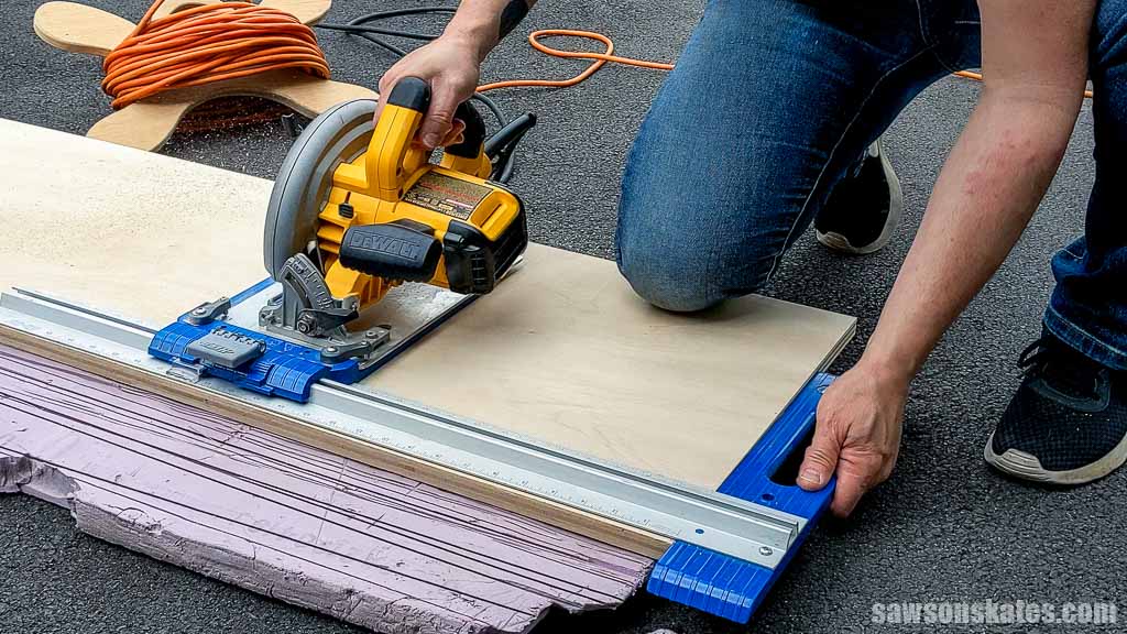 Cutting a piece of plywood with a circular saw and Kreg Rip Cut