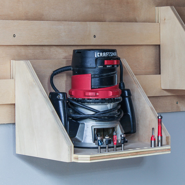 Handheld router on a DIY French cleat router shelf
