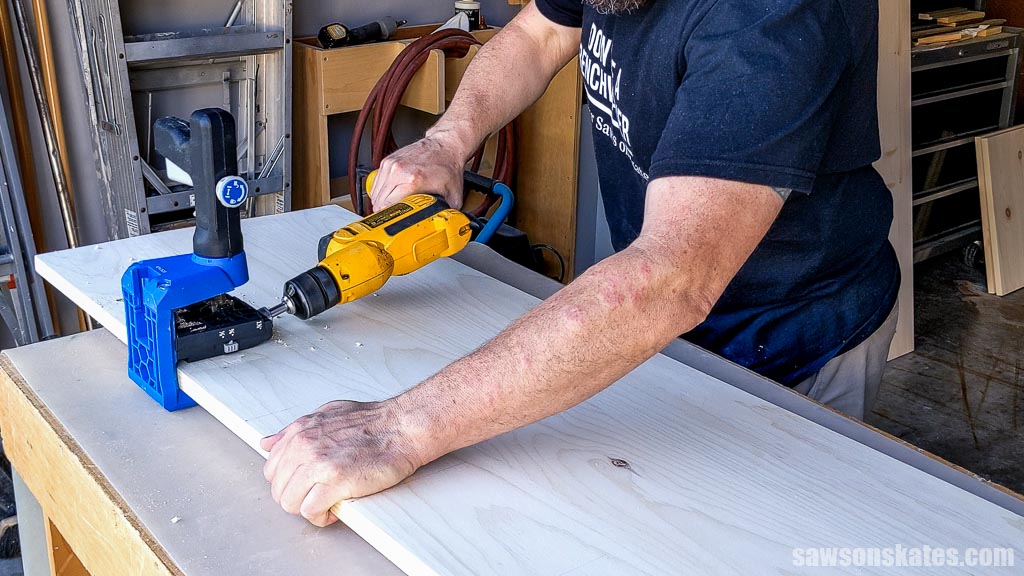 Drilling pocket holes on a side panel
