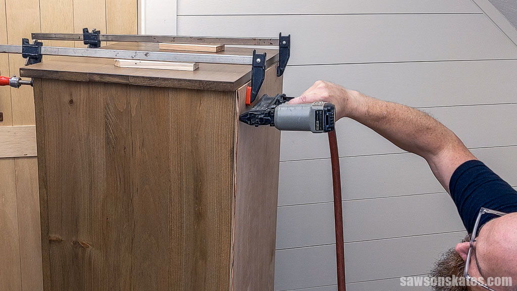 Attaching the back to the case using a brad nailer