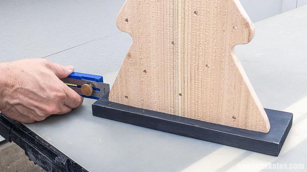 Centering a wooden Christmas tree on its base