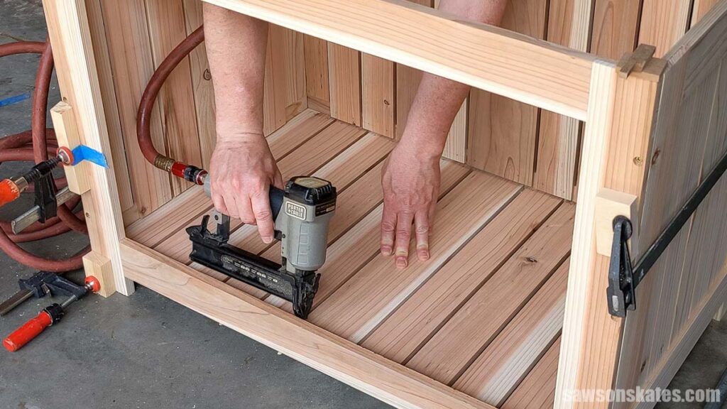 Attaching the bottom slats with brad nails