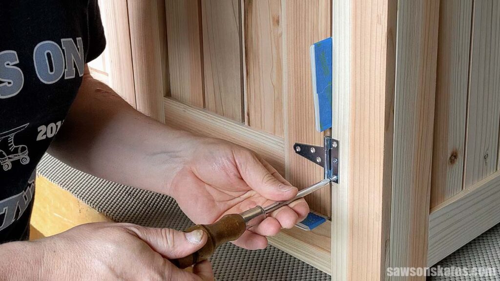 Attaching a hinge with screws