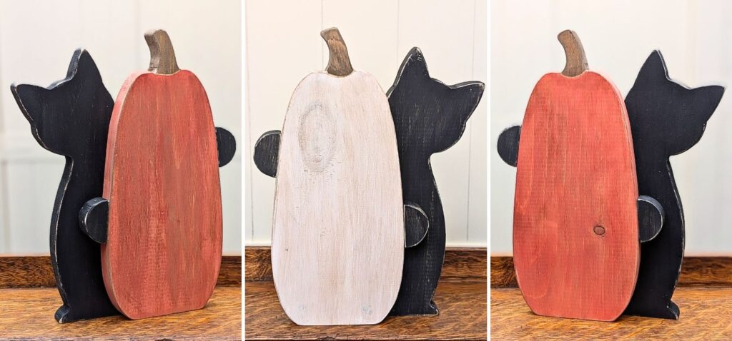 Three pumpkins and cats made from wood