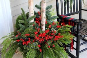 Christmas porch urns with birch logs