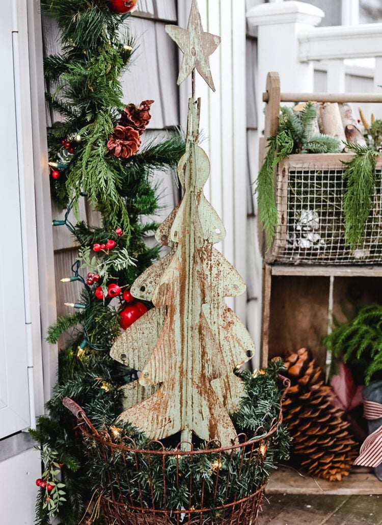front porch Christmas decor with greenery