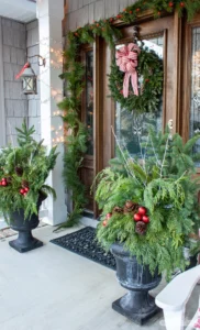 side view of Christmas porch with fresh greenery