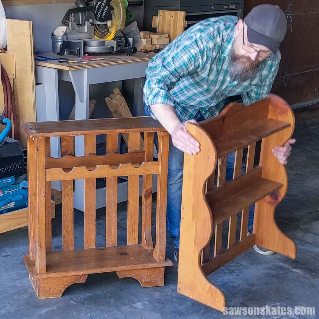 Scott lifting the top of a wooden baker's rack
