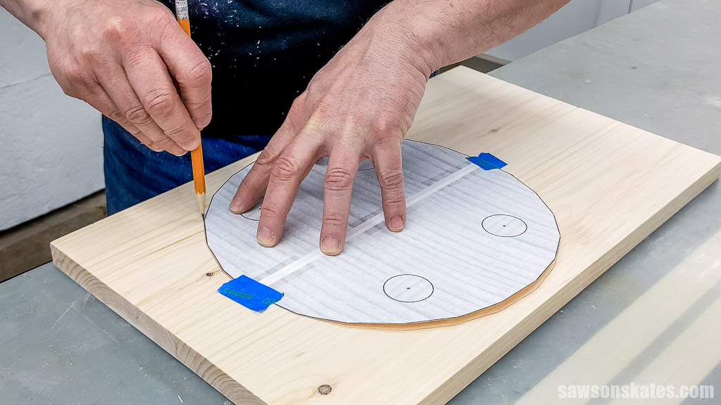 Tracing the template onto a board using a pencil