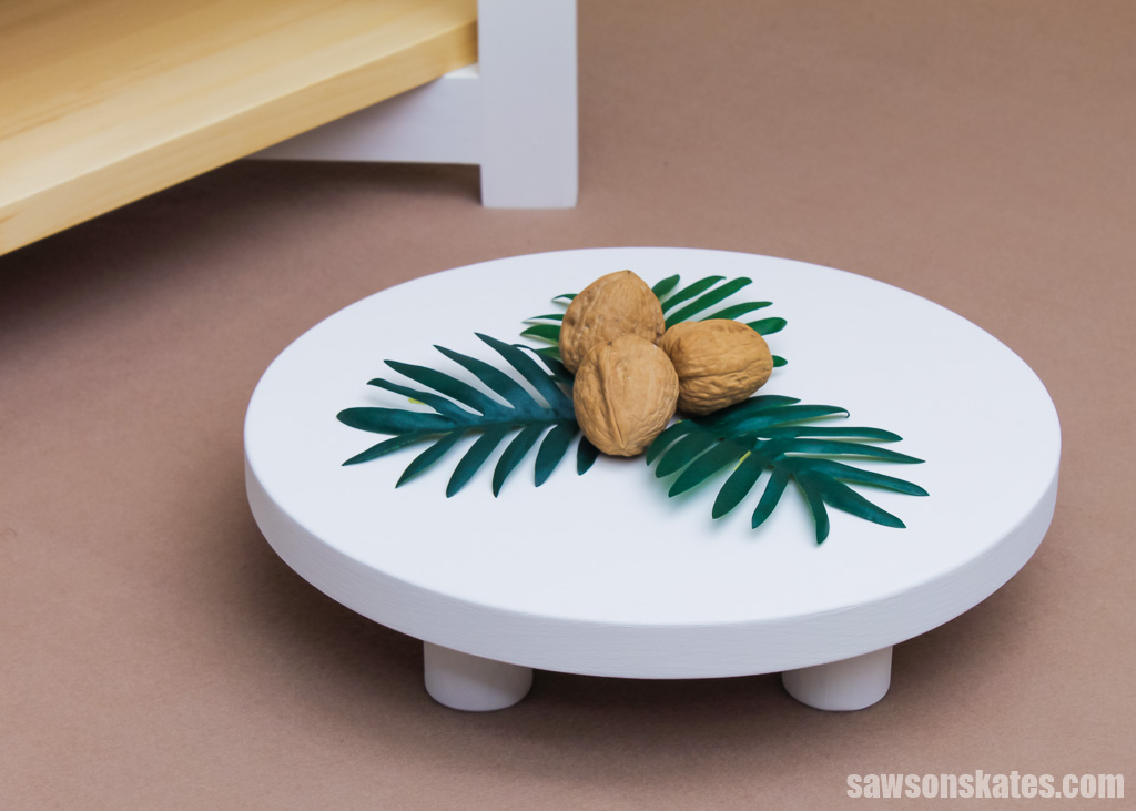 Closeup of a DIY cake and cupcake stand's cake plate on a table