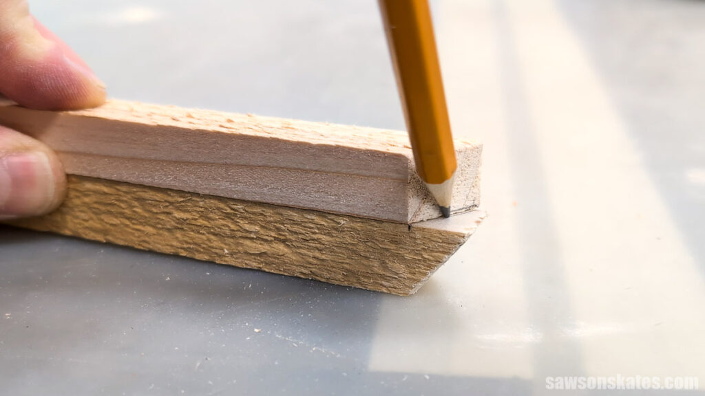 Using a pencil to mark an angled cut