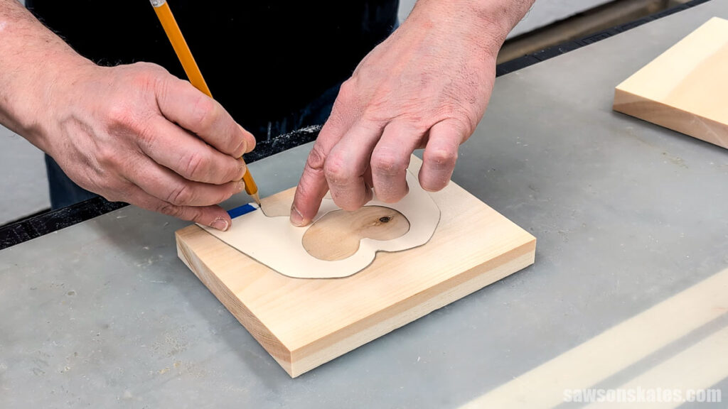 Tracing a template on scrap wood