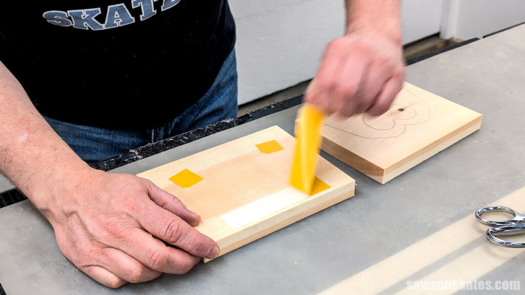 Removing double-side tape from a board