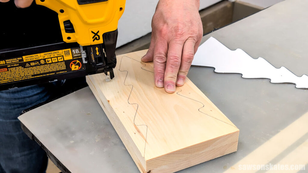 Tacking one board to a second with a brad nailer