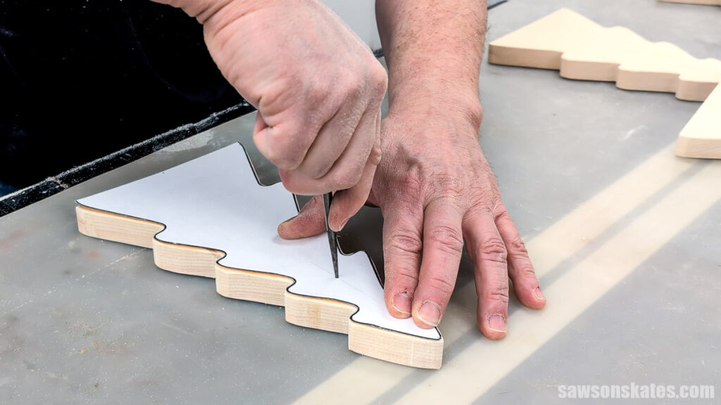 Using an awl to make a starting point for a drill bit