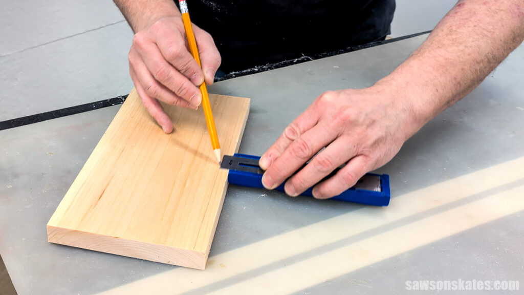 Marking a guideline along the edge of a board