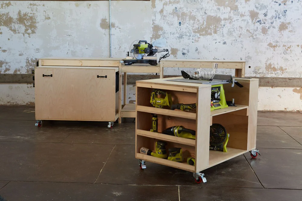 Mobile DIY workbench and miter saw station with rolling storage carts, open shelving, and locking casters for a flexible small workshop layout.