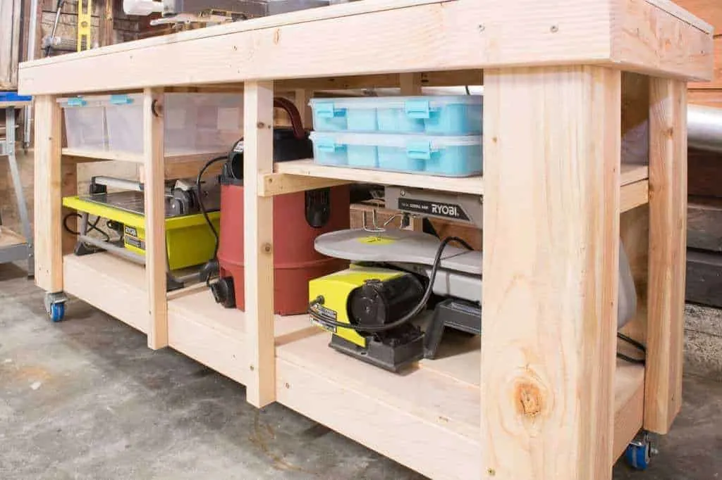 Workbench on casters with storage shelves below