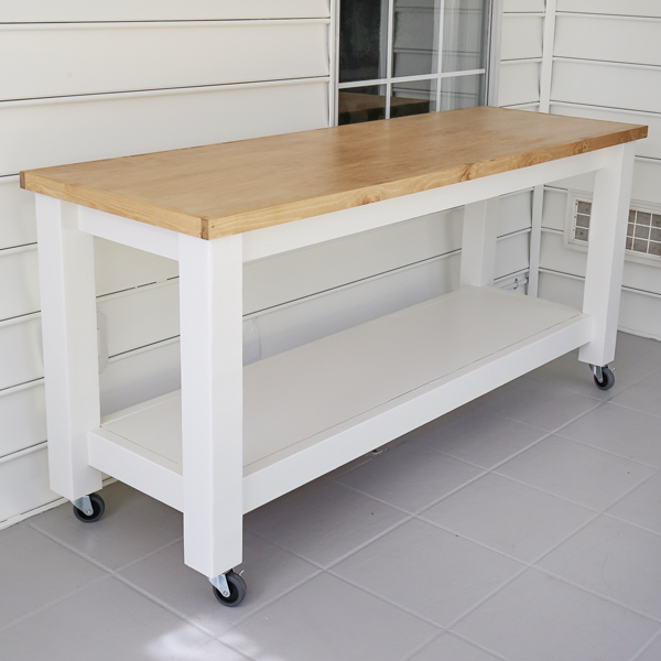 Mobile workbench with a white-painted base and natural top
