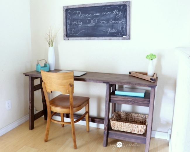 Wood A-Frame style desk in a corner of a room