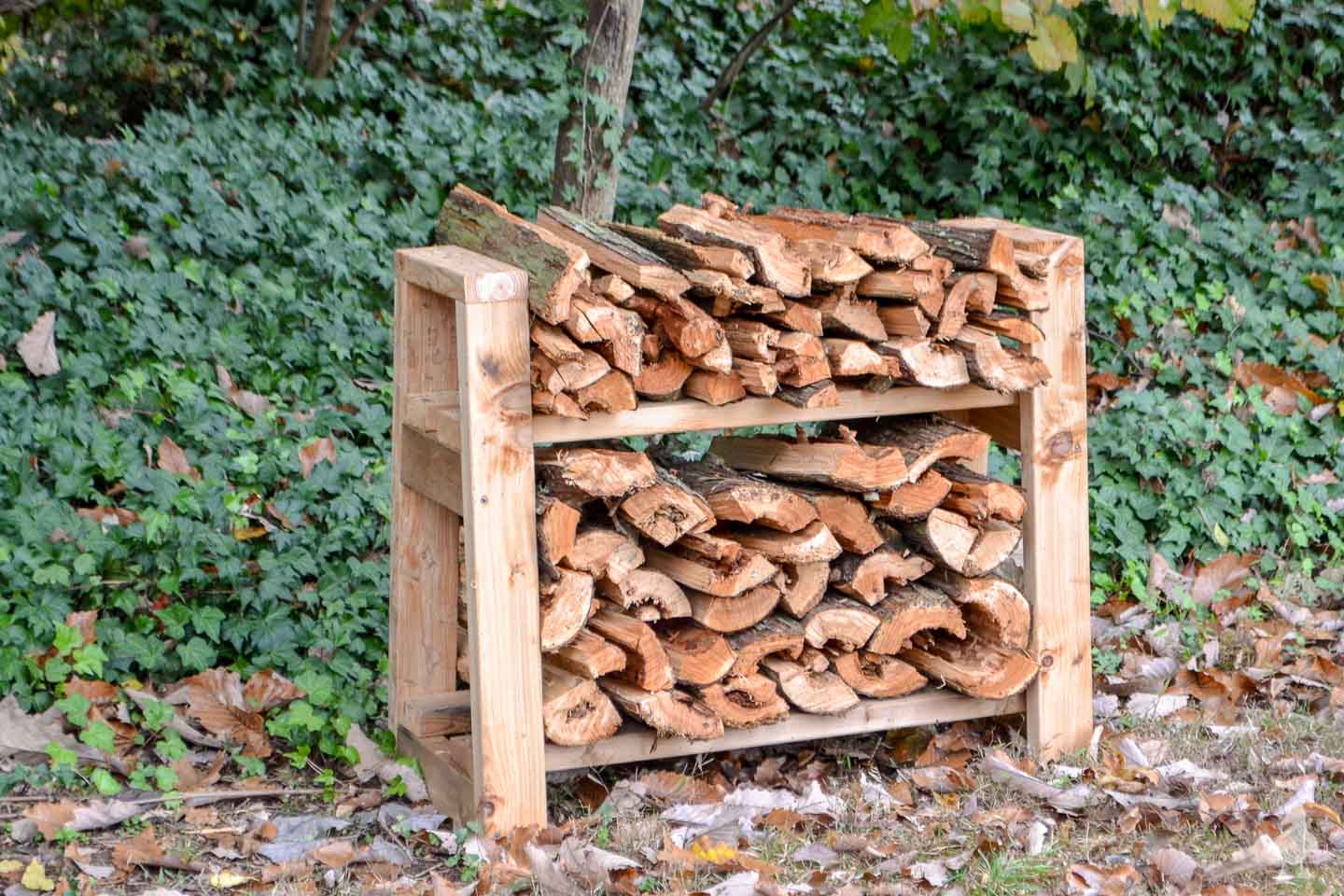 Handmade firewood stand in a yard