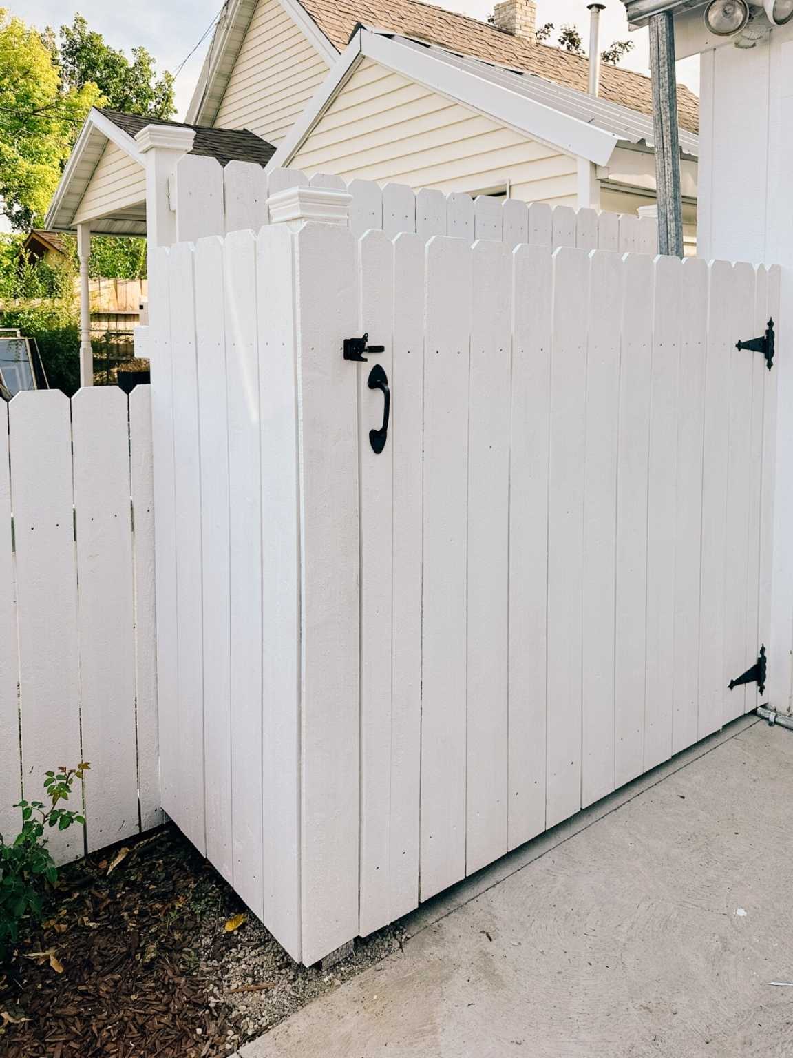 White wood garbage can enclosure